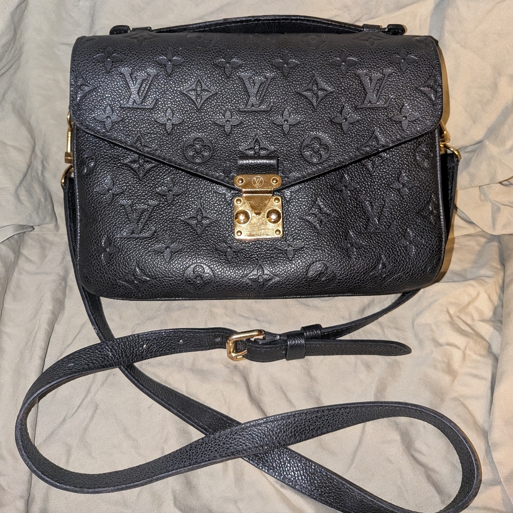 Louis Vuitton Pochette Métis handbag black Monogram Empreinte Leather